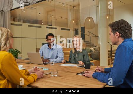 Business professionals discussing in meeting at office Stock Photo