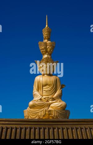 China, Sichuan, Emeishan City, Golden statue of Samantabhadra at summit of Mount Emei Stock Photo