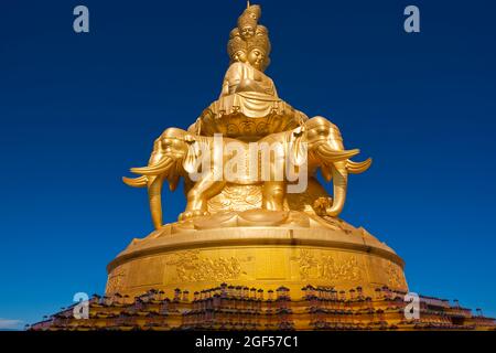 China, Sichuan, Emeishan City, Golden statue of Samantabhadra at summit of Mount Emei Stock Photo