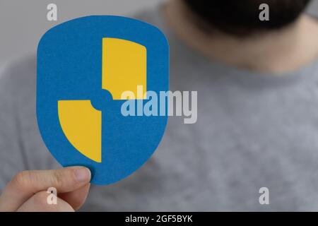 Person presenting cybersecurity and information or network protection symbol Stock Photo