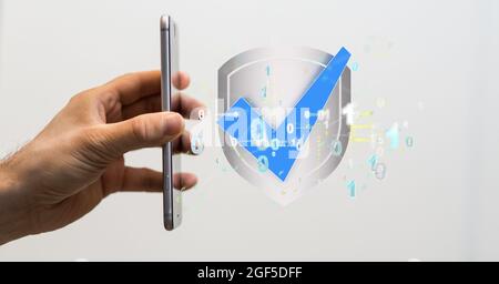 Person presenting the virtual projection of cybersecurity cocnept Stock Photo