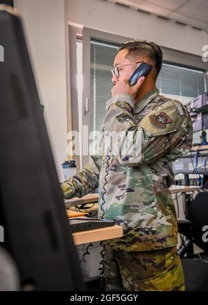 An Airman assigned to the 721st Aerial Port Squadron provides support to Operation Allies Refuge at Ramstein Air Base, Germany, Aug. 22, 2021. The 721st APS supports the 521st AMOW missions by coordinating ground support requirements and cargo worldwide.(U.S. Air Force photo by Senior Airman Jan K. Valle) Stock Photo