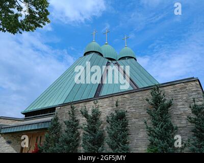 Ukrainian Catholic Church of the Holy Eucharist in Toronto, with a modern architectural variation on the traditional onion shaped domes Stock Photo