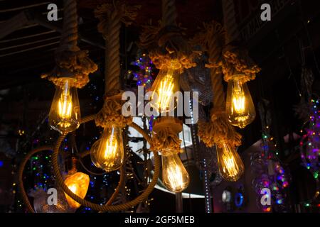 Light bulb electric energy. Vintage Light bulb close up. Close up image of vintage light bulb. Stock Photo