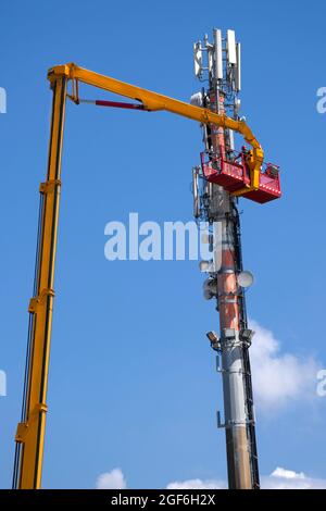 Ordinary maintenance and control to an antenna for communication Stock Photo