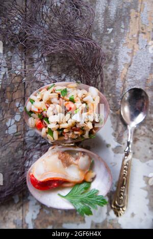 Presentation of the risotto warm to Fasolaro co parsley and garlic Stock Photo