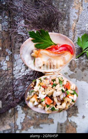 Presentation of the risotto warm to Fasolaro co parsley and garlic Stock Photo