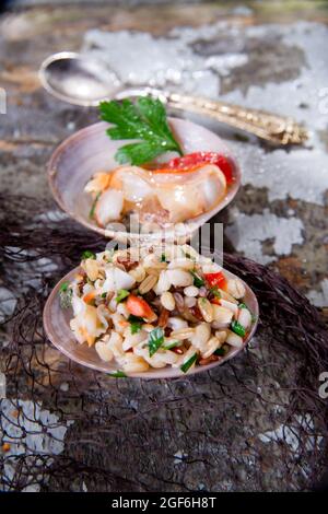 Presentation of the risotto warm to Fasolaro co parsley and garlic Stock Photo