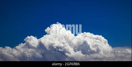 Dramatic blue sky cloud formation Stock Photo