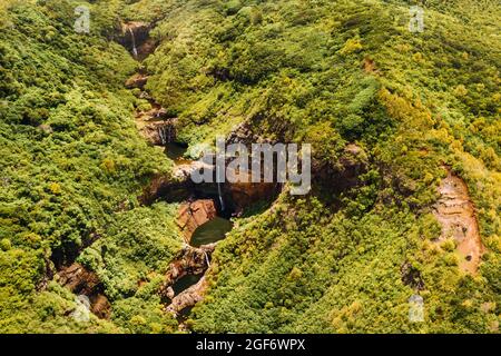 Aerial top view perspective of Tamarin Waterfall Seven Cascades in the tropical island jungle of Mauritius Stock Photo