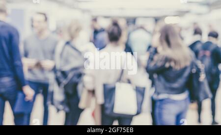 Blured image of businesspeople socializing and networking during coffee break at conference meeting. Stock Photo