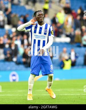 Yves Bissouma of Brighton celebrates their win after the Premier League match between Brighton and Hove Albion and Watford at the American Express Stadium  , Brighton , UK - 21st August 2021 -  Editorial use only. No merchandising. For Football images FA and Premier League restrictions apply inc. no internet/mobile usage without FAPL license - for details contact Football Dataco Stock Photo