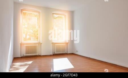 Bright, sunny white room in the room in an old building Stock Photo