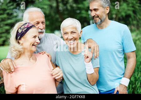 outdoor senior fitness woman man lifestyle active sport exercise healthy fit retirement Stock Photo