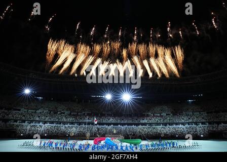 Tokyo, Japan. 24th Aug, 2021. Fireworks explode over Olympic Stadium during the opening ceremony of Tokyo 2020 Paralympic Games in Tokyo, Japan, Aug. 24, 2021. Credit: Hu Huhu/Xinhua/Alamy Live News Stock Photo