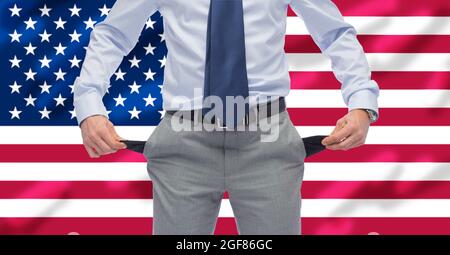 close up of businessman showing empty pockets Stock Photo