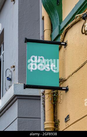 Kinsale, Ireland- July 13, 2021: The sign for An Post, the irish post office in Kinsale Country Cork Stock Photo