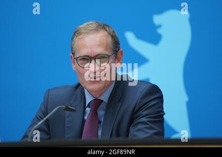 Berlin, Germany. 24th Aug, 2021. Michael Müller (SPD), Governing Mayor, speaks at a press conference after the Berlin Senate meeting. Among other things, the Senate dealt with topics such as housing construction in Berlin and the arrival of local Afghan forces in the capital. Credit: Jörg Carstensen/dpa/Alamy Live News Stock Photo