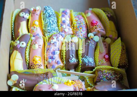 halves bananas in chocolate decorated Stock Photo