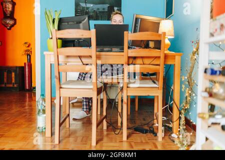 Woman working from home dressed pajama Stock Photo