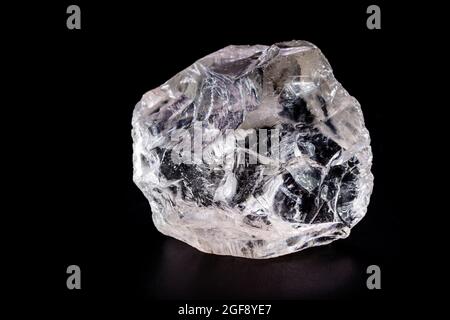 rough diamond, crystal in an allotropic form of carbon, uncut gemstone, concept of luxury or wealth Stock Photo