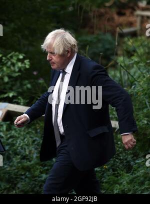 London, England, UK. 24th Aug, 2021. UK Prime Minister BORIS JOHNSON is seen returning to 10 Downing Street after hosting a virtual G7 Leaders Meeting on Afghanistan where he was expected to ask US President Joe Biden to extend the deadline to leave Afghanistan beyond 31 August. (Credit Image: © Tayfun Salci/ZUMA Press Wire) Stock Photo