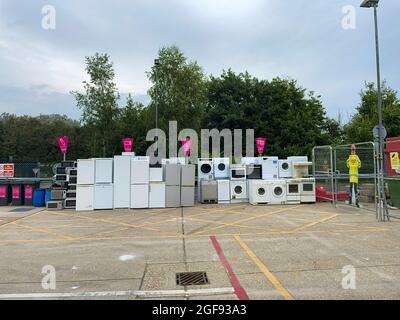 Microwaves,washing machines,freezers,tumble dryers,fridges are stacked in a recycling centre compound Stock Photo