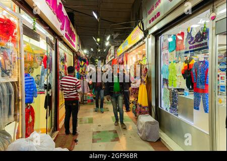 Kolkata, West Bengal, India - 29th December 2019 : People walking inside New Market at esplanade area in the evening. It is one of the oldest and busi Stock Photo