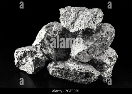 Palladium is a chemical element that at room temperature contracts in the solid state. Metal used in industry. Mineral extraction concept. Stock Photo