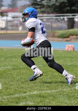 Football action with Post Falls vs Coeur d'Alene High School in Coeur d'Alene, Idaho. Stock Photo