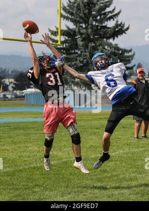 Football action with Post Falls vs Coeur d'Alene High School in Coeur d'Alene, Idaho. Stock Photo