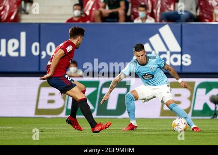 Pamplona, Spain. 23rd Aug, 2021. Nacho Vidal (defender; CA Osasuna) and Carlos Dominguez (defender; RC Celta) in action during the Spanish La Liga Santander match between CA Osasuna and RC Celta at Sadar stadium.(Final Score; CA Osasuna 0:0 RC Celta) (Photo by Fernando Pidal/SOPA Images/Sipa USA) Credit: Sipa USA/Alamy Live News Stock Photo