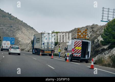 Marbella, Malaga, Spain August 24, 2021, highway operator assists a broken down truck on the road AP-7 Stock Photo