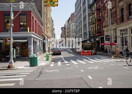 New York, NY, USA - Aug 24, 2021: Looking east on Grand Street at the intersection of West Broadway and Grand St Stock Photo