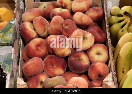 Paraguayan peaches as a background, in a market. Stock Photo