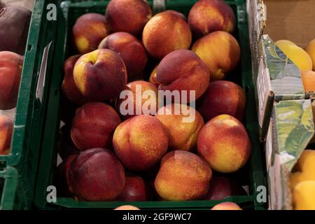 bright nectarines in the market Stock Photo