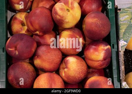 bright nectarines in the market Stock Photo