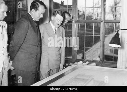 Hitler and Albert Speer together in the Obersalzburg looking at plans for a new opera house in Linz, Austria. Credit: German Bundesarchiv Stock Photo