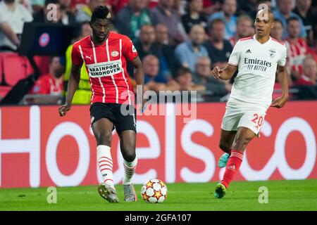 EINDHOVEN, NETHERLANDS - AUGUST 24: Ibrahim Sangare of PSV and Joao Mario of Benfica during the UEFA Champions League Play-Offs Leg Two match between PSV and Benfica at Philips Stadion on August 24, 2021 in Eindhoven, Netherlands (Photo by Geert van Erven/Orange Pictures) Stock Photo