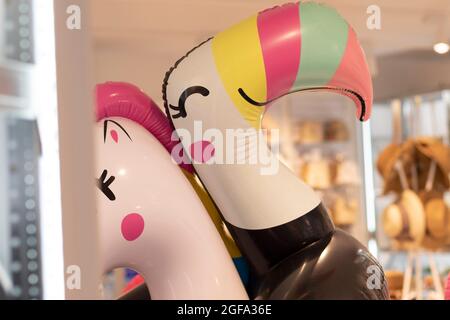 Giant inflatable flamingo, selective focus, pool float party, trendy summer concept. Stock Photo