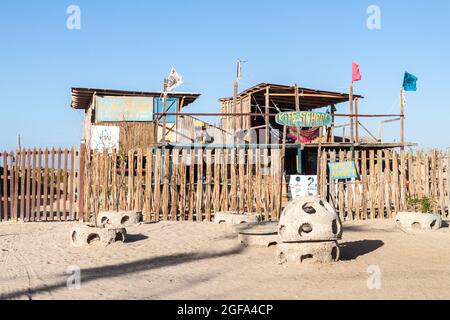 CABO DE LA VELA, COLOMBIA - AUGUST 23, 2015: Kitesurfing school in a small fishing village Cabo de la Vela located on La Guajira peninsula. Stock Photo