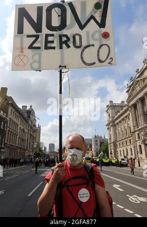 London, England, UK. 24th Aug, 2021. Climate change campaign group Extinction Rebellion activists blocks Whitehall in London in the second day of two weeks of planned action. (Credit Image: © Tayfun Salci/ZUMA Press Wire) Stock Photo