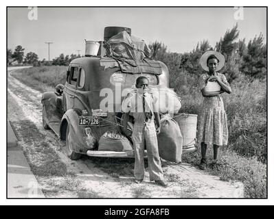 Migrant Workers African American July 1940. 'North Carolina. Mother & son Florida migrants on their way to Cranbury New Jersey, to pick potatoes.'  Photo by Jack Delano for the Farm Security Administration LOC  America USA Stock Photo