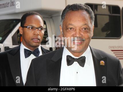 Jesse Jackson and son Yusef DuBois Jackson arriving at the opening night of 'Motown: The Musical' at The Lunt Fontanne Theatre in New York City on April 14, 2013.  Photo Credit: Henry McGee/MediaPunch Stock Photo