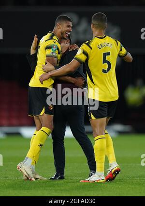 Watford manager Xisco Muñoz (right) claps after the Premier League ...