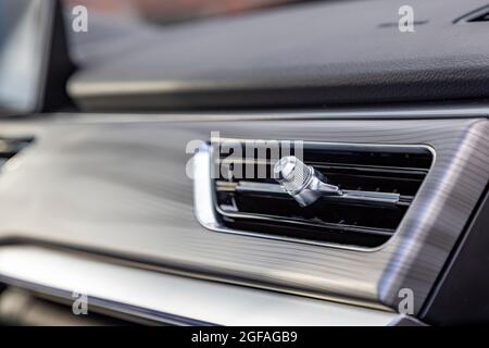 Round car ventilation grille on dashboard of a modern luxury car. Close up  Stock Photo - Alamy