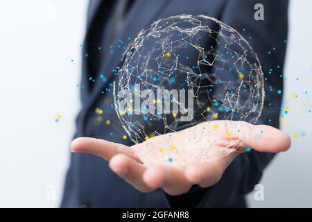 Male's hand holding an illustration of the Neural network concept - Connected cells with links. Stock Photo