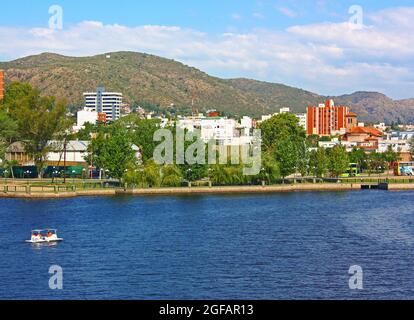 VILLA CARLOS PAZ, CORDOBA, ARGENTINA The Town in a sunny day. The San Roque lake in foreground and the hills at the background. Stock Photo