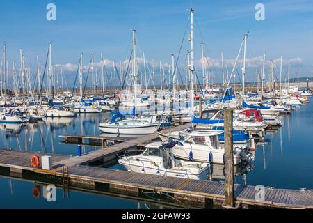 Troon marina with yachts and motor boats tied up at the floating ...