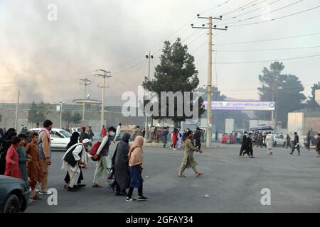 Kabul, Afghanistan. 24th Aug, 2021. Afghans gather outside the Hamid Karzai International Airport to flee the country, in Kabul, Afghanistan, on Tuesday, August 24, 2021. Photo by Bashir Darwish/UPI Credit: UPI/Alamy Live News